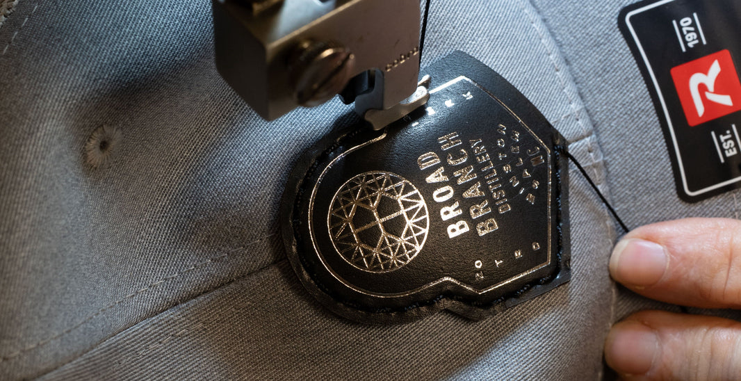 Sewn vs. Heat-Pressed Leather Patch Hats: What’s the Difference?
