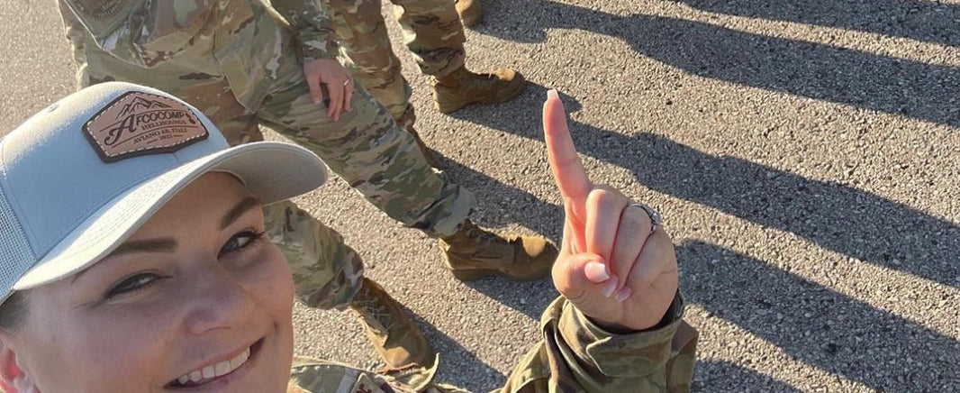 Women in military wearing a custom leather patch hat