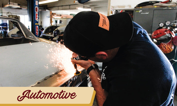 Custom leather patch hat featured on a man grinding the rear end of a car