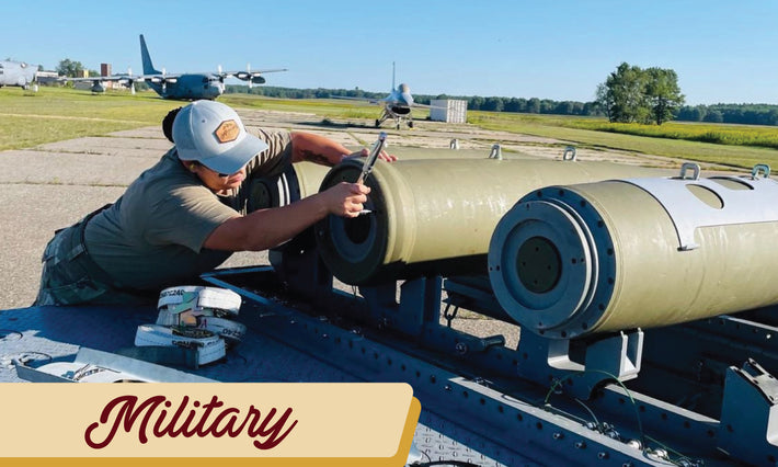 Custom leather patch hat featured on a women working in the military on large machinery