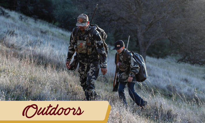 Custom leather patch hats featured on a father and son hunting in the outdoors